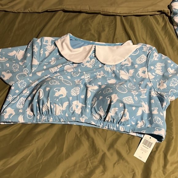 Alice in wonderland swimsuit from hot topic it’s a little large for me - Picture 3 of 3